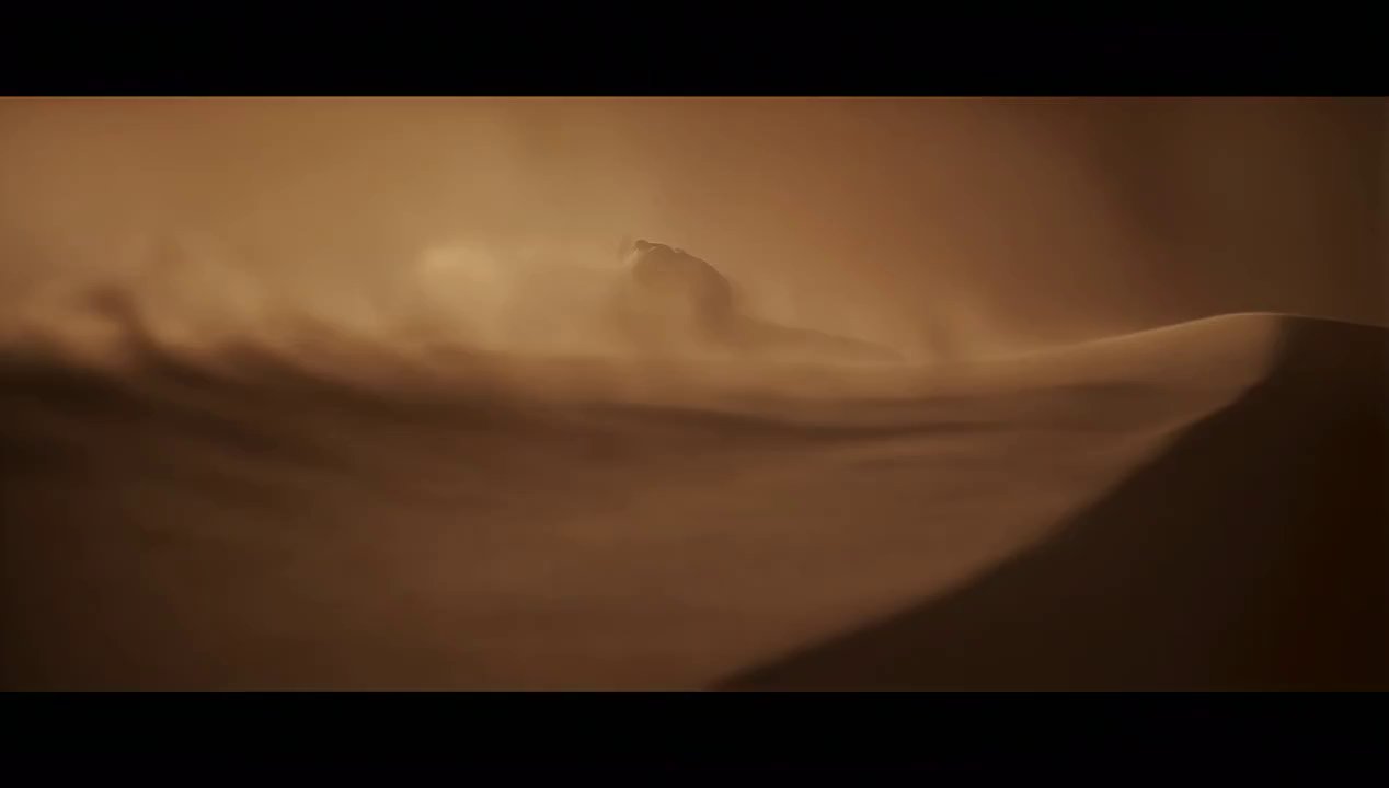 Ancient Statue Rises from Desert Sands in Storm
