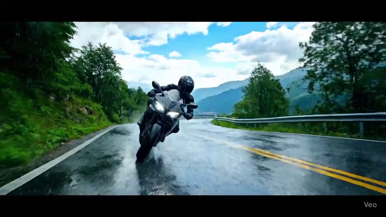 Rainy Mountain Ride: Motorcyclist Leans into Curves - Veo 3 AI video prompt thumbnail