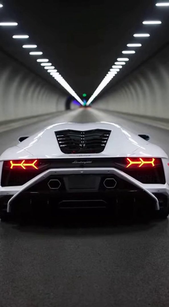 [Sora 2] Ultra-realistic cinematic shot of a white Lamborghini Revuelto driving inside a long underground tun... - Veo 3 AI video prompt thumbnail