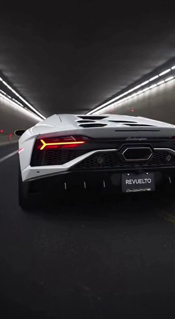 [Sora 2] Ultra-realistic cinematic shot of a white Lamborghini Revuelto driving inside a long underground tun... - Veo 3 AI video prompt thumbnail