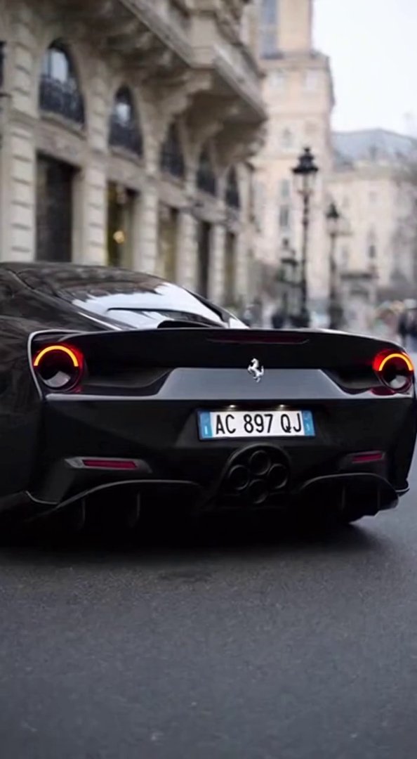 [Sora 2] Vidéo ultra réaliste de 10 secondes montrant une Ferrari Novitec entièrement noire, peinture brillan... - Veo 3 AI video prompt thumbnail