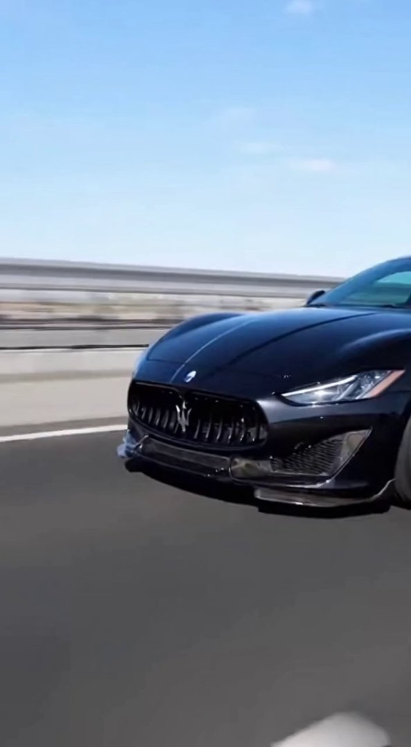 [Sora 2] “Scène ultra-réaliste d’une Maserati GranTurismo 2026 full black, exactement comme sur les images de... - Veo 3 AI video prompt thumbnail