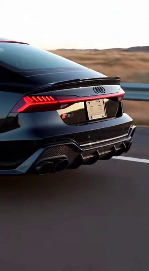 [Sora 2] Vidéo cinématographique ultra photoréaliste d’une Audi RS7 noire (dernière génération), véhicule rée... - Veo 3 AI video prompt thumbnail