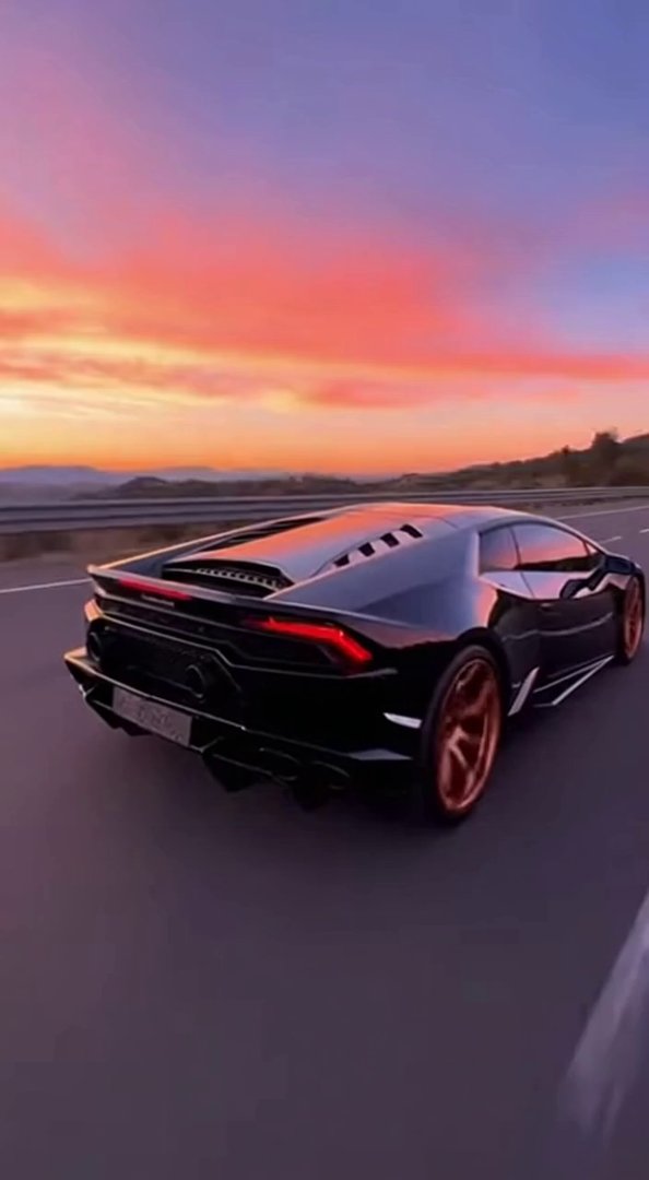 [Sora 2] « Vidéo ultra réaliste d’une Lamborghini Huracán noire roulant sur une grande route ouverte en haute... - Veo 3 AI video prompt thumbnail