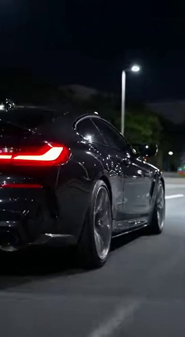 [Sora 2] **“Vidéo ultra-réaliste d’une BMW M8 Competition 2025 noire, filmée de l’extérieur au format TikTok.... - Veo 3 AI video prompt thumbnail