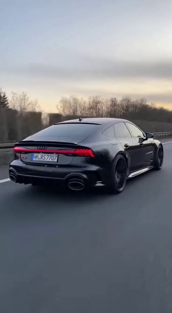 [Sora 2] Vidéo cinématographique ultra photoréaliste d’une Audi RS7 noire (dernière génération), véhicule rée... - Veo 3 AI video prompt thumbnail