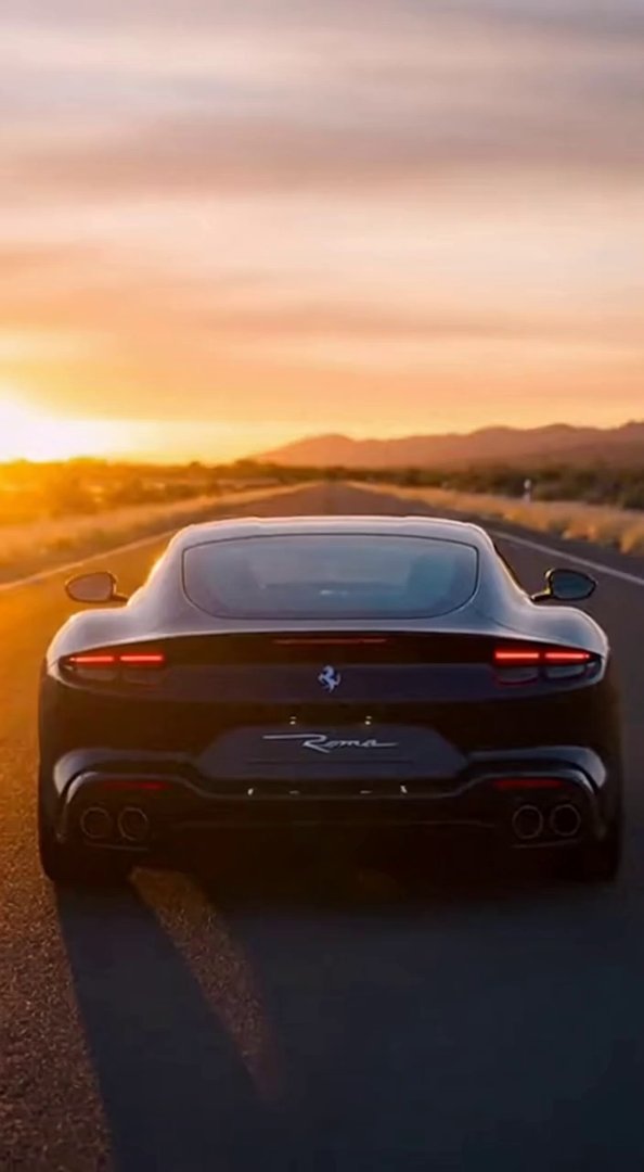 [Sora 2] « Ferrari Roma 2025 noire, ultra réaliste, filmée de l’arrière sur une longue route vide au coucher ... - Veo 3 AI video prompt thumbnail