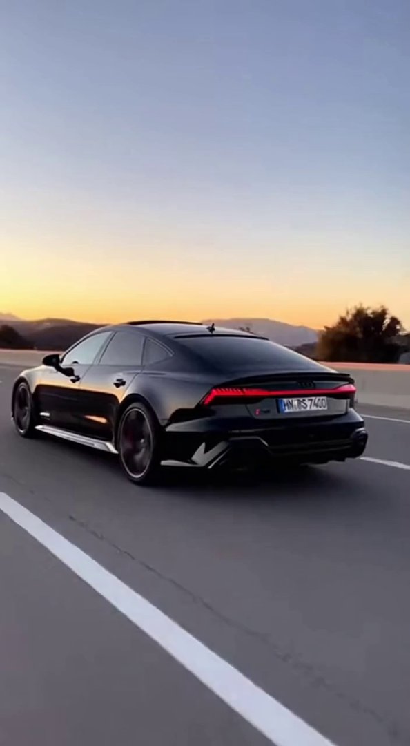 [Sora 2] Vidéo cinématographique ultra photoréaliste d’une Audi RS7 Performance noire, proportions exactes, p... - Veo 3 AI video prompt thumbnail