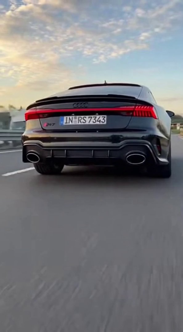 [Sora 2] Vidéo cinématographique ultra photoréaliste d’une Audi RS7 noire (dernière génération), véhicule rée... - Veo 3 AI video prompt thumbnail