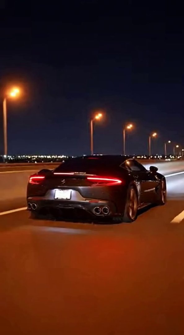 [Sora 2] **Vidéo ultra-réaliste d’une supercar noire récente, inspirée d’un modèle réel (Ferrari Roma, Ferrar... - Veo 3 AI video prompt thumbnail