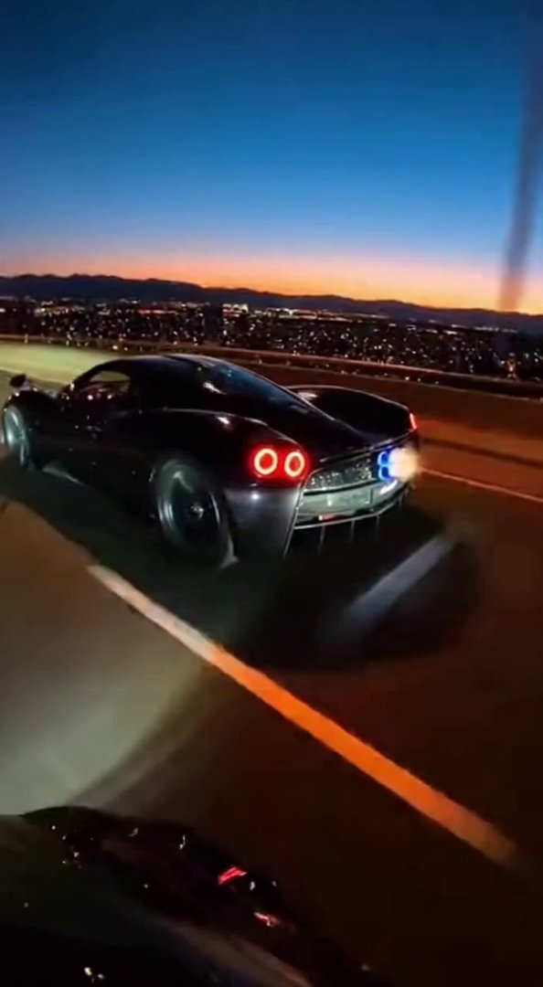 [Sora 2] Vidéo cinématographique hyper réaliste d’une Pagani Utopia noire, véhicule réel, aucune stylisation ... - Veo 3 AI video prompt thumbnail