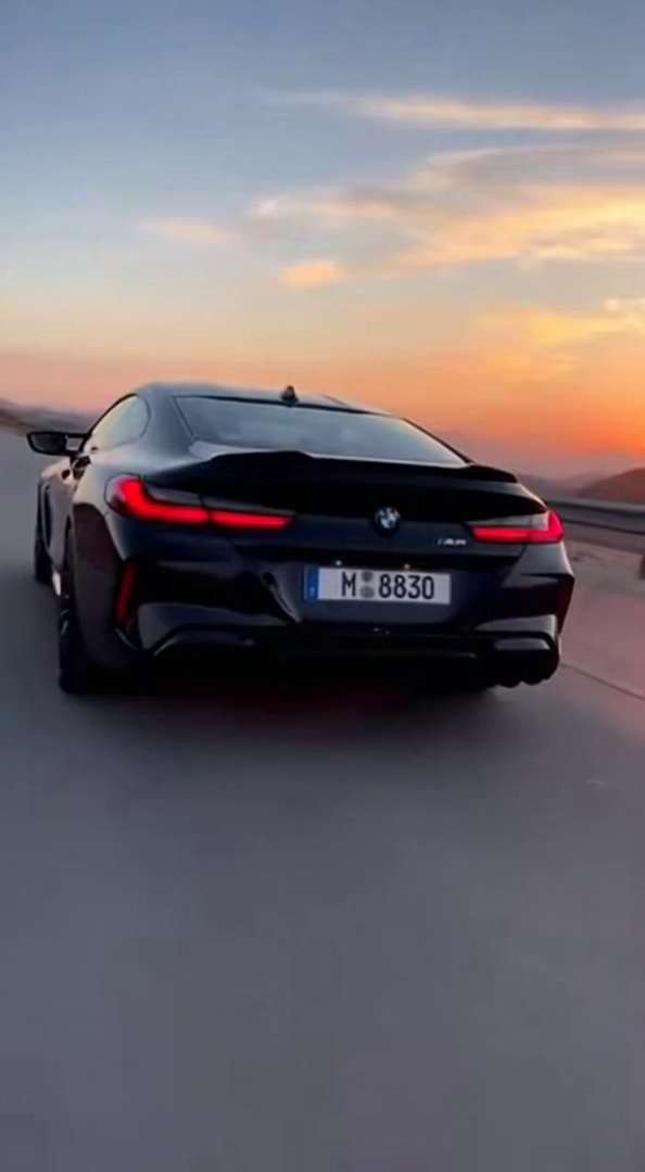 [Sora 2] Vidéo cinématographique hyper réaliste d’une BMW M8 noire, véhicule réel, aucun style cartoon, aucun... - Veo 3 AI video prompt thumbnail