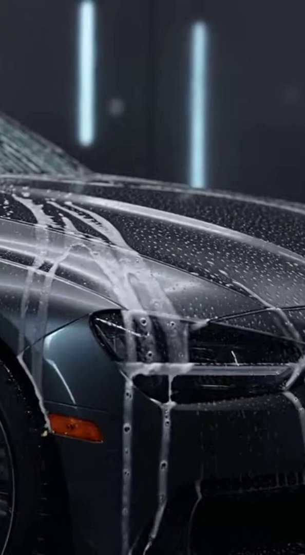[Sora 2] A cinematic close-up of a luxury car being washed.
Thick white foam slowly covers the car body.
Wa... - Veo 3 AI video prompt thumbnail