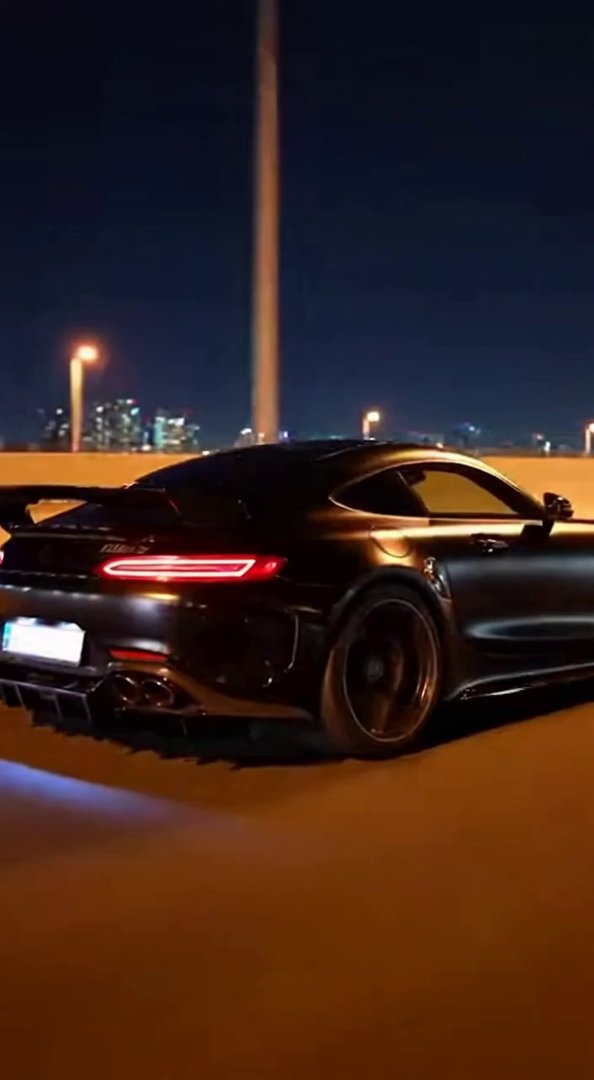 [Sora 2] Vidéo cinématographique ultra photoréaliste d’une Mercedes-AMG GT Black Series noire, véhicule réel,... - Veo 3 AI video prompt thumbnail