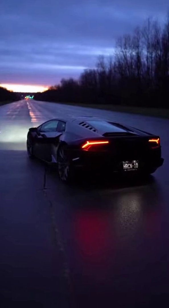 [Sora 2] « Vidéo ultra-réaliste d’une Lamborghini Huracán noire sur une route vide au crépuscule.
Plan large... - Veo 3 AI video prompt thumbnail