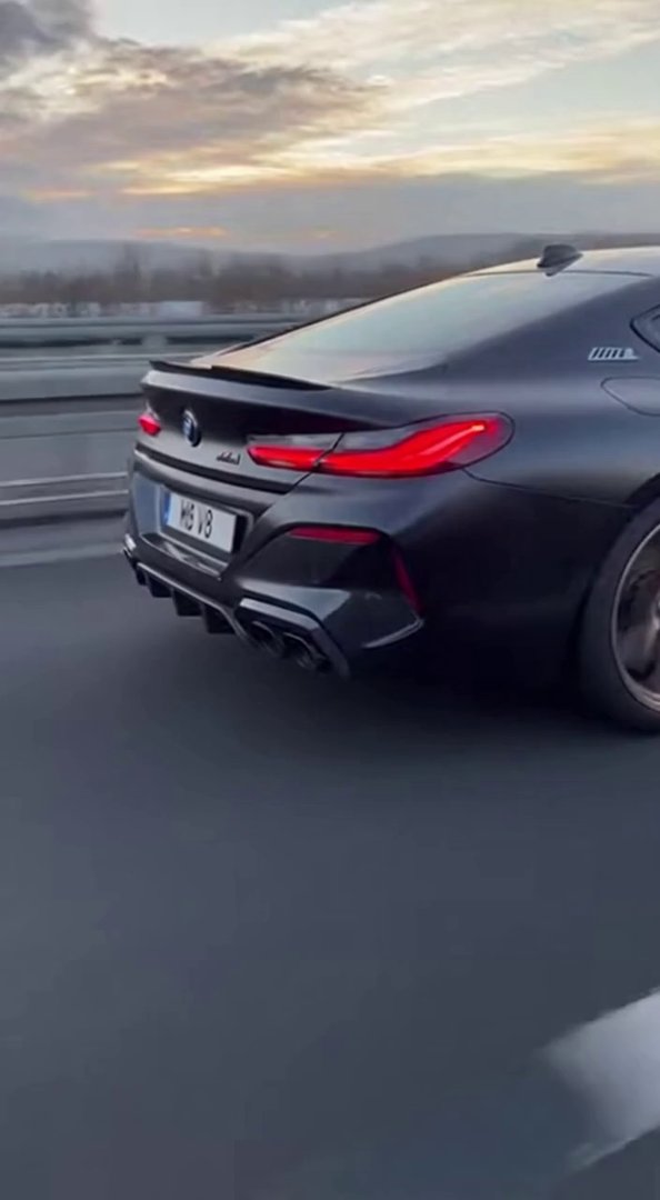 [Sora 2] Vidéo cinématographique ultra hyper réaliste d’une BMW M8 noire, véhicule réel, proportions exactes,... - Veo 3 AI video prompt thumbnail