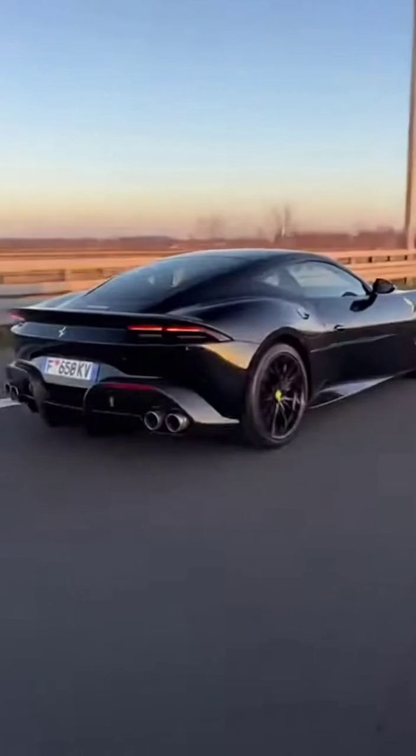 [Sora 2] Vidéo cinématographique hyper réaliste d’une Ferrari Roma noire, véhicule réel, aucun style cartoon,... - Veo 3 AI video prompt thumbnail