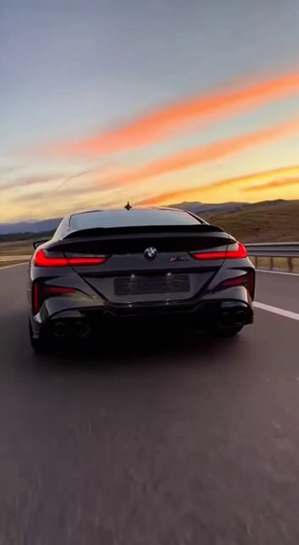 [Sora 2] Vidéo cinématographique hyper réaliste d’une BMW M8 GT Sport noire, avec le logo “M8” clairement vis... - Veo 3 AI video prompt thumbnail