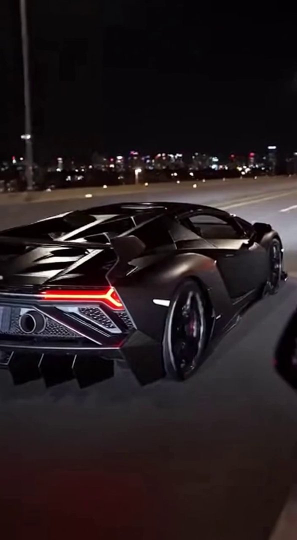 [Sora 2] Vidéo cinématographique ultra photoréaliste d’une Lamborghini Veneno Roadster noire, véhicule réel, ... - Veo 3 AI video prompt thumbnail