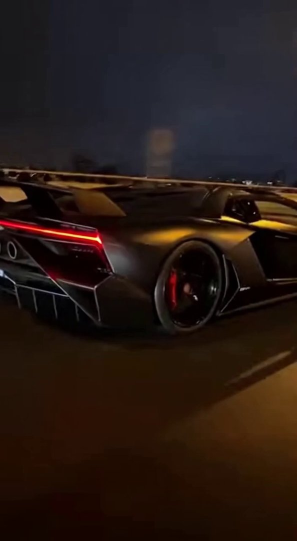 [Sora 2] Vidéo cinématographique ultra photoréaliste d’une Lamborghini Veneno Roadster noire, véhicule réel, ... - Veo 3 AI video prompt thumbnail